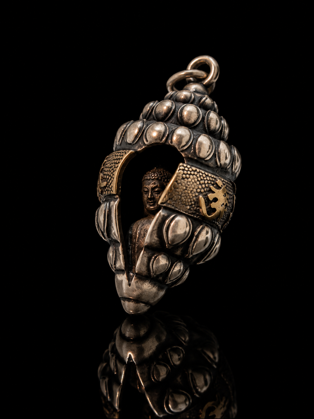 Tibetan silver small conch-shell ghau pendant · Dharma conch amulet for Buddha offering