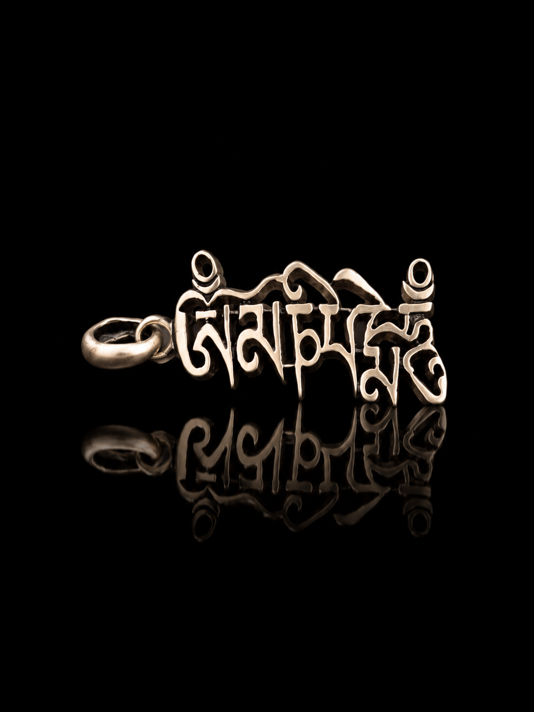 Tibetan Six-Syllable Mantra Hollow Silver Pendant · Om Mani Padme Hum artistic script
