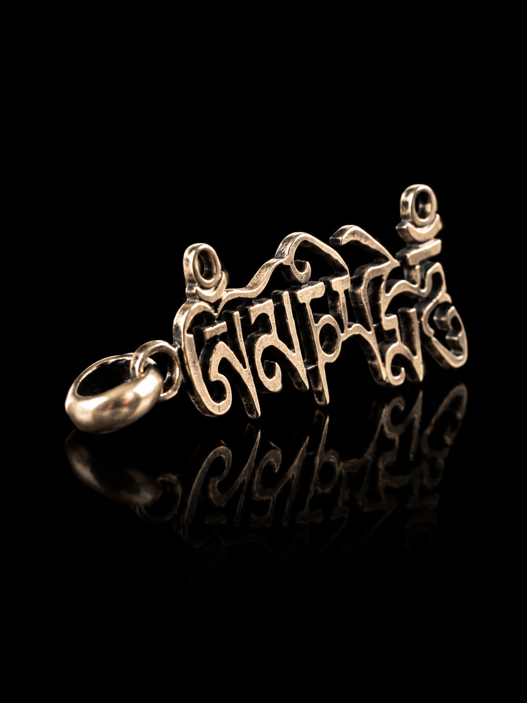 Tibetan Six-Syllable Mantra Hollow Silver Pendant · Om Mani Padme Hum artistic script