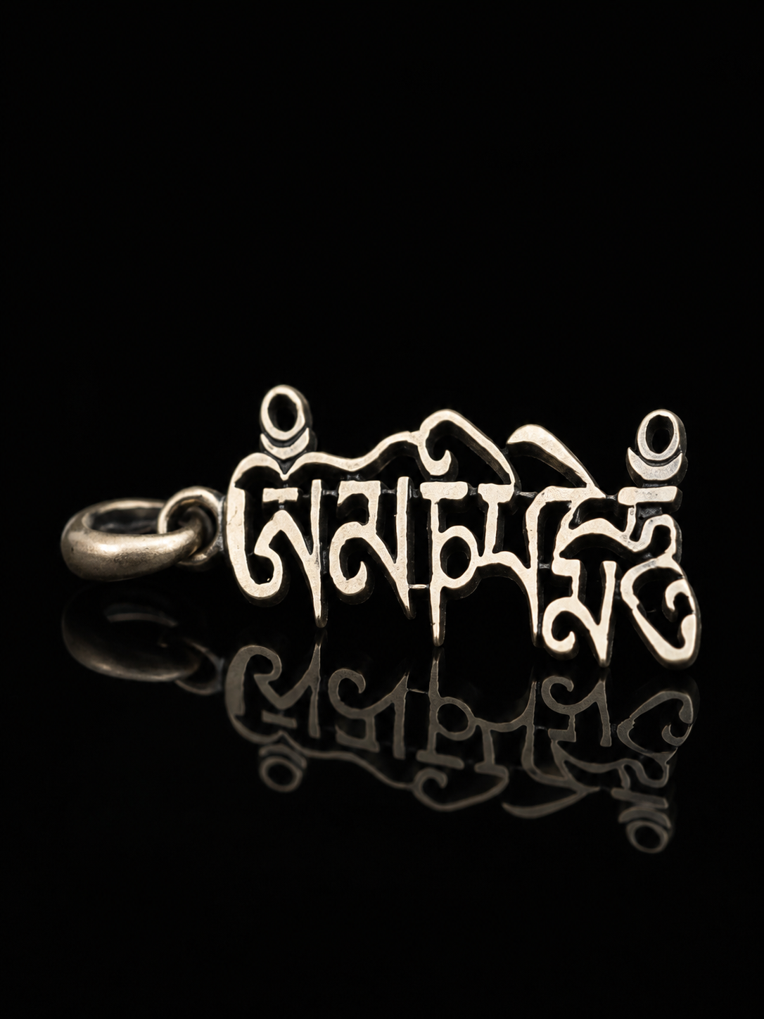 Tibetan Six-Syllable Mantra Hollow Silver Pendant · Om Mani Padme Hum artistic script