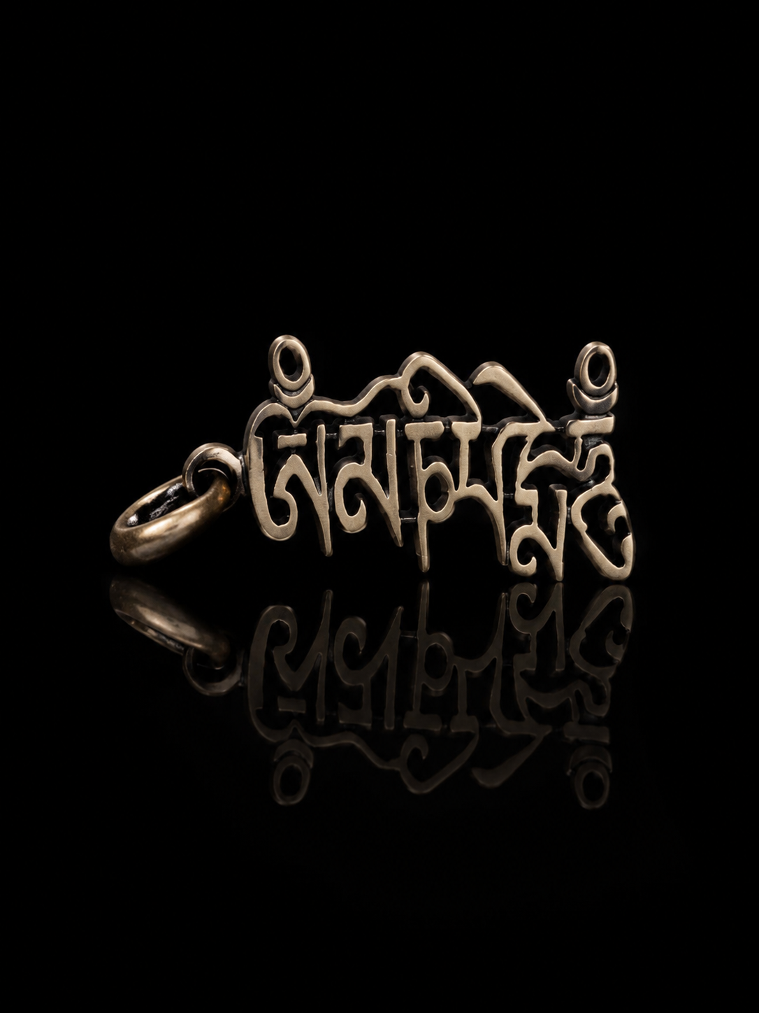 Tibetan Six-Syllable Mantra Hollow Silver Pendant · Om Mani Padme Hum artistic script